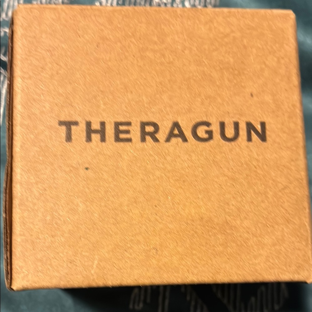 Theragun Brown Box